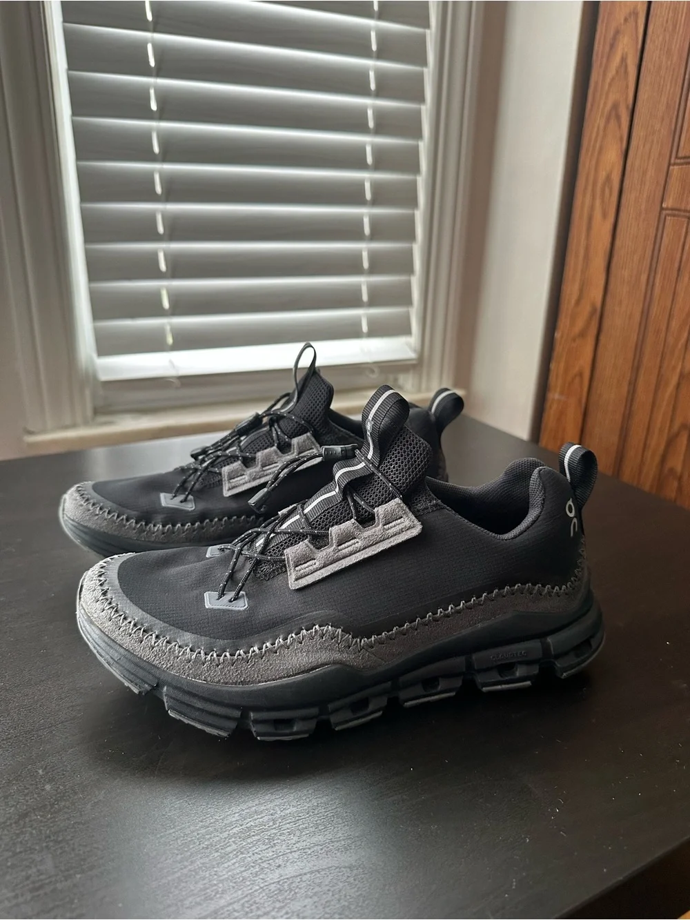 On Cloud Running women’s Black and Gray Trail Sneakers